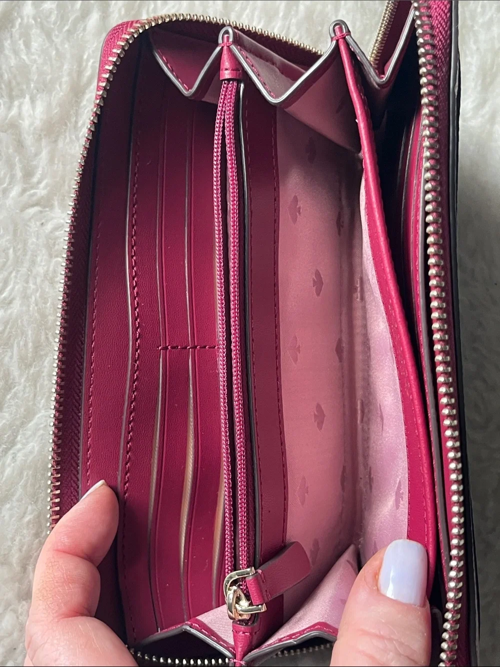 kate spade raspberry pebbled leather zip-around wallet